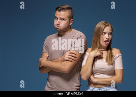 Picture of two friends standing next to each other. They finally decided to start business together. Best friends are ready to overcome everything to Stock Photo
