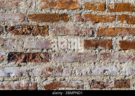 Abstract Brick Wall Surface. Marble Textured Background of Old Brick Wall Stock Photo