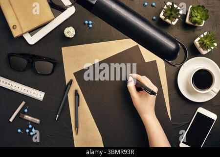 Architect working on blueprint. Architects workplace - architectural project, blueprints, tablet pc. Construction concept. Engineering tools. Copy spa Stock Photo