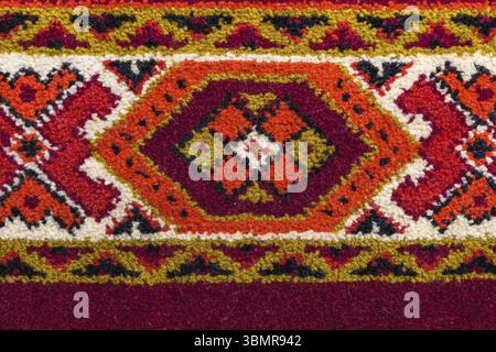 Retro carpet texture with hand-made decorative geometric pattern Stock Photo