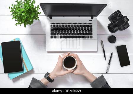 Overhead view of businesswoman working at computer in office. Place for your text. Ideal for blog. flat lay on white background Stock Photo