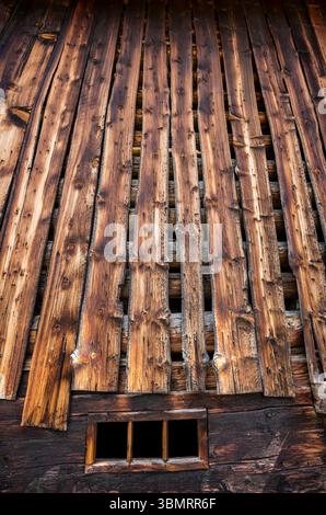 Close-up of the wooden planks of an old barn in the Swiss village of Sedrun Stock Photo
