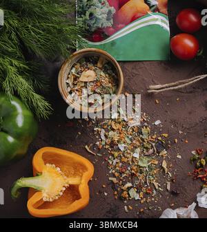 food still-life, Various spices for dish with peppers and tomatoes Stock Photo