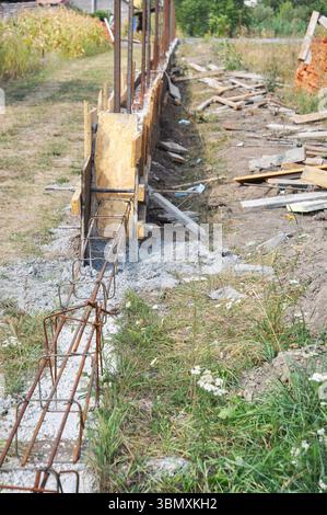 The installation of steel in a trench for a house foundation Stock ...