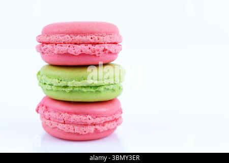 It is Three macaroons isolated on white. Stock Photo