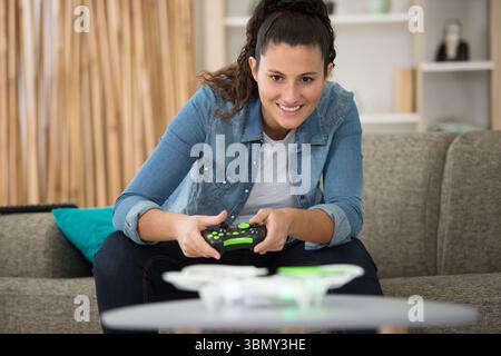 woman using drone hold it in her hand Stock Photo