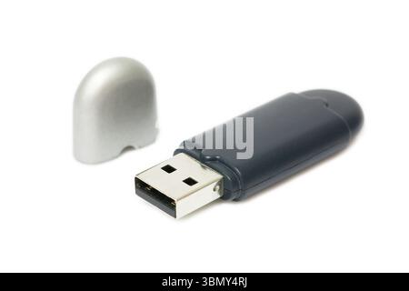 It is One external bluetooth usb with lid isolated on white. Stock Photo