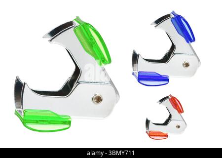 It is Three staple removers isolated on white. Stock Photo