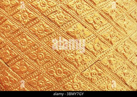 it is gold painted wall for pattern and background. Stock Photo