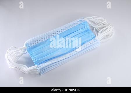 Stack of medical disposable masks Stock Photo