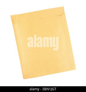 it is close brown envelope by staples isolated on white. Stock Photo