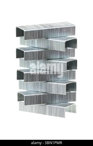 It is Stack of staples isolated on white. Stock Photo