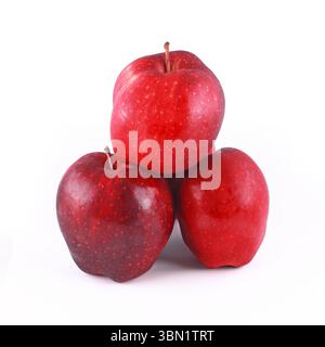 It is Pile of red apples isolated on white. Stock Photo