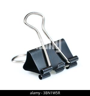 It is Black paper clip isolated on white. Stock Photo