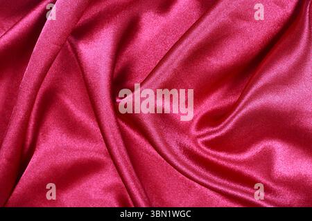 It is Curved design on red silk for pattern and background. Stock Photo