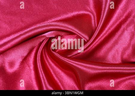 It is Curved design on red silk for pattern and background. Stock Photo
