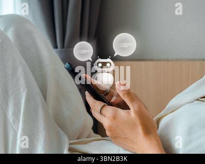 AI chatbot technology concept. Artificial intelligence conversation assistant, robot with speech bubble virtual hologram, chat GPT application on smar Stock Photo