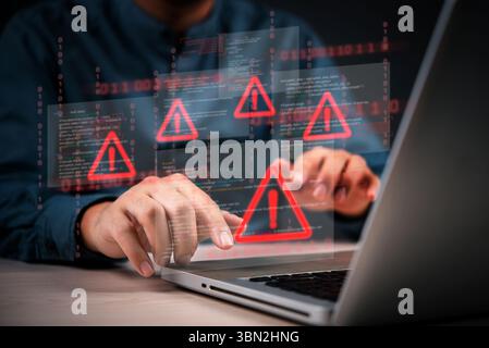 Cybersecurity warning with coding glitch and malware alert shown on digital interface, representing data breach and system vulnerability.Hacking attem Stock Photo