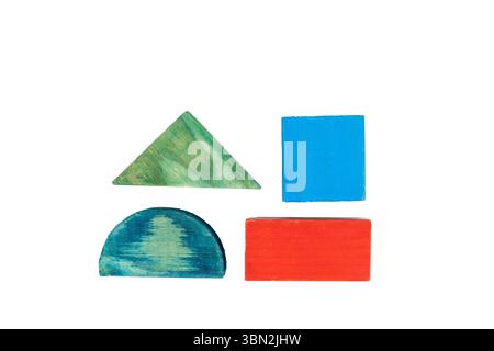 Wooden Geometry Shapes of Triangle, Square, Half Circle and Rectangular Stock Photo