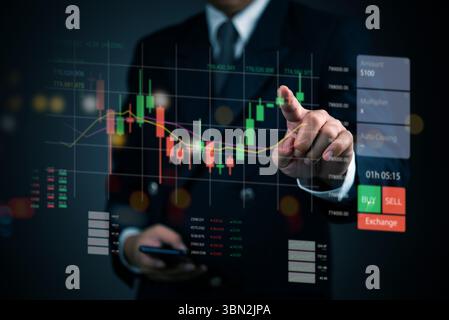 Close-up of hand analyzing forex chart and trading indicators on tablet. Ideal for stock trading, market analysis, trading strategy, and financial mar Stock Photo