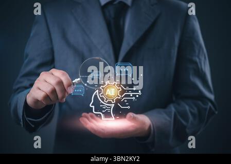 Business technology innovation with AI brain icon and magnifying glass, development and innovation artificial intelligence, data analysis, and automat Stock Photo