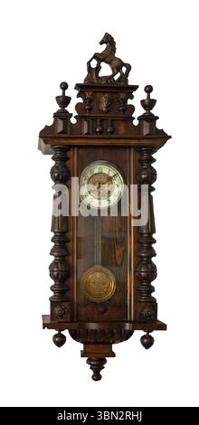 Vintage wall clock with a pendulum in a mahogany case on a white background, isolate Stock Photo
