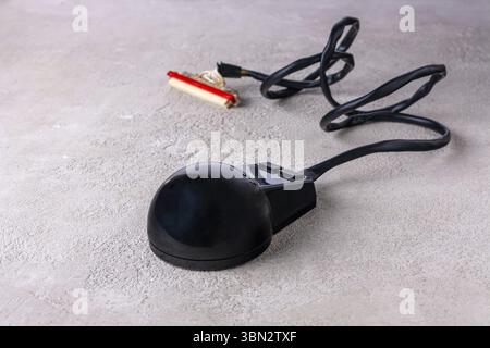 The first wired computer mouse released in 1990s in Russia, selective focus Stock Photo