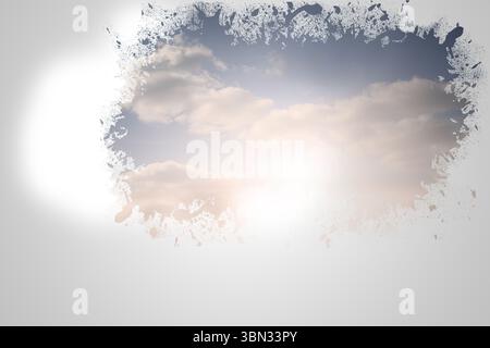 Splash on wall revealing bright sky Stock Photo