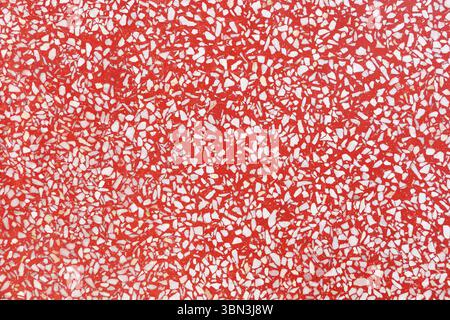 it is red marble with white stone texture for pattern and background. Stock Photo