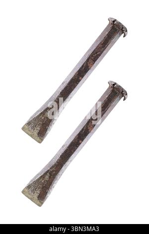 it is two used steel chisels isolated on white. Stock Photo