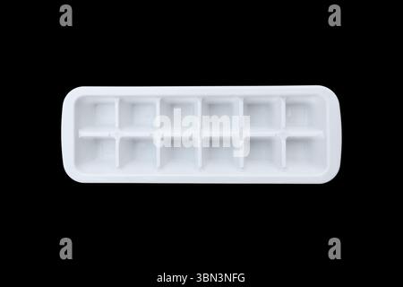it is white plastic ice making tray isolated on black. Stock Photo