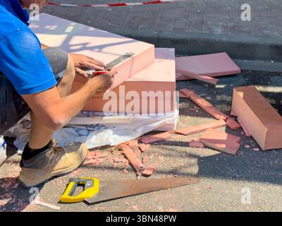 ITE. Exterior thermal insulation on an old house, based on polyurethane foam. Stock Photo
