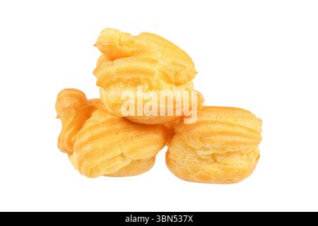 pile of eclair or profiterole isolated on white. Stock Photo
