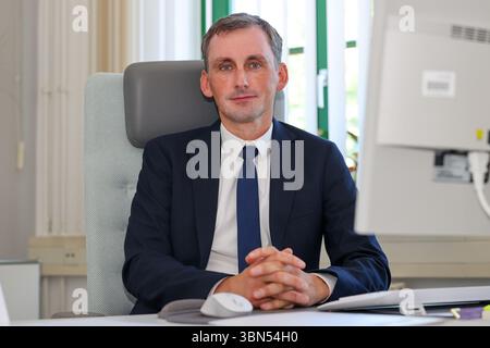 Magdeburg, Germany. 30th June, 2025. Jan Riedel (CDU) looks into the ...