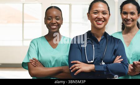 Group of Cheerful Healthcare Professionals in a Bright Professional Environment Stock Photo
