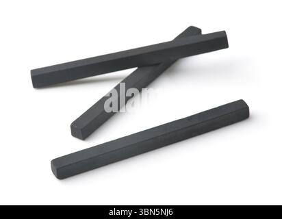 Compressed charcoal drawing sticks isolated on white Stock Photo