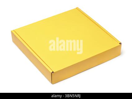 Blank yellow flat cardboard box isolated on white Stock Photo