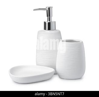 White  empty ceramic bathroom toothbrush holder, soap dispenser, soap plate set isolated on white Stock Photo