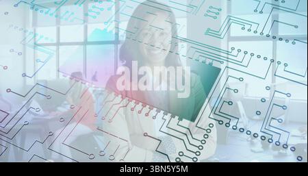 In office, smiling woman with circuit board pattern overlay, creating image Stock Photo