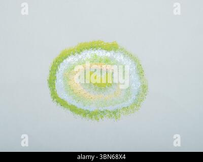 Pastel green, silver, and gold hues, creating a textured, swirling effect against a light gray background. Stock Photo