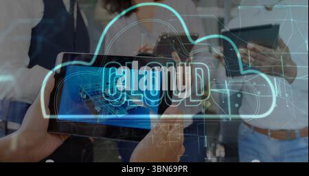 Tablet projecting blue cloud hologram in office, professionals holding smartphone wearing suits Stock Photo