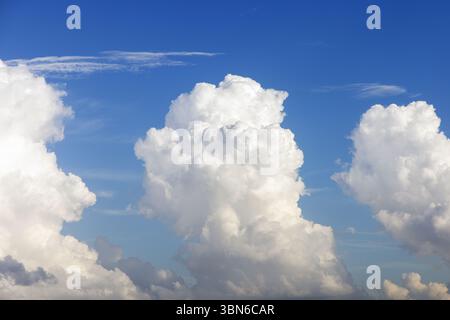 Towering cumulonimbus clouds in Iowa during a summer sunset. Stock Photo
