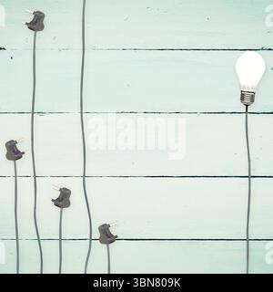Light bulbs on wooden background Stock Photo