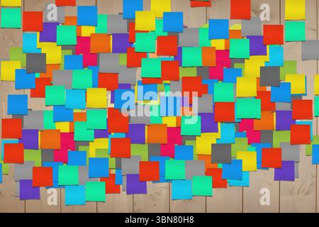 Various sticky notes hanging on wall Stock Photo