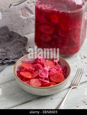 Red cabbage and carrots – raw vegan mix in a jar Stock Photo