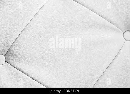 Wide Light white luxury upholstery sofa texture background clean gray vintage leather furniture pattern wallpaper, Panoramic elegant armchair Stock Photo