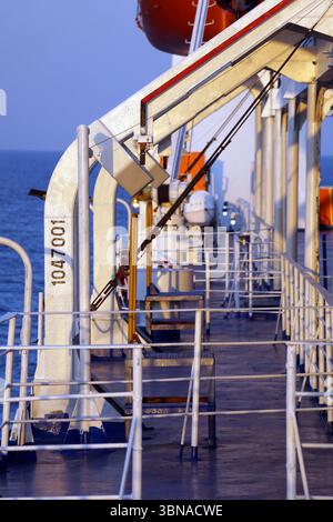 A portion of a ship's deck, likely a lifeboat or similar safety ...