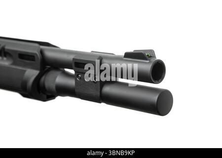 Shotgun barrel close-up with fiber optic front sight and magazine extension tube, isolated on white background. Stock Photo