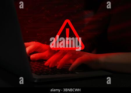 Cyber attack alert notification. Red warning sign and circuit board on ...