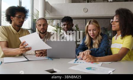 Group of multiracial diversity students e-learning together studying in high school pupils gathering men women girls guys in college university with Stock Photo